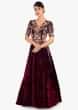 Maroon long reception gown with embellished bodice  and waistline