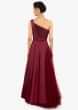 Maroon satin floor length top paired with matching net skirt in satin lining