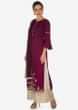 Maroon straight suit in embroidered hem line with cream palazzo only on Kalki