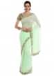 Mint georgette saree adorned with cut dana embroidery only at Kalki 