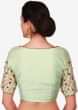 Mint green lehenga in tissue enhanced in frenchknot and zardosi embroidery work only on Kalki