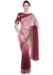 Mist pink and wine shaded saree in satin georgette with lace border only on Kalki