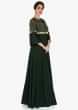 Moss green dress in georgette with cut dana and tassel work only on Kalki