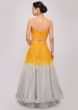 Mustard and grey  shades lehenga paired with strapless blouse and  frilled dupatta