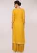 Mustard georgette suit in gotta patch embroidery and butti in floral motif 