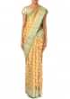 Mustard saree featuring in weaved butti and gotta border only on Kalki