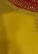 Mustard silk unstitched with zari embroidered neckline and hemline