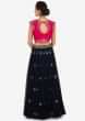 Navy blue and rani pink lehenga encrusted in zari and sequin embroidery work only on Kalki