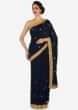 Navy blue saree in moti and zardosi butti along with contrast border only on Kalki