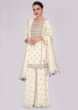 Off white cotton suit and palazzo in embroidery and butti 