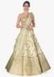 Off white raw silk lehenga with sequins and cut dana in paisley motifs