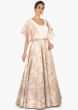 Off white and baby pink gown enhanced with brocade only on Kalki 