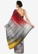Off white, red and yellow shaded saree in print and kundan work only on Kalki