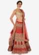 Orange lehenga in raw silk decorated in sequin and zari embroidered work only on Kalki