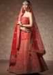 Ox red lehenga with unstitched blouse in gotta patch and zari embroidery