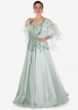 Pale Powder Blue Organza, Net and Satin Gown with Ornate Handwork Only on Kalki