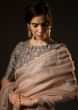 Pastel Peach Saree In Organza With Contrasting Grey Blouse Online - Kalki Fashion