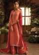 Peach cotton silk unstitched suit paired with floral weaved bottoms and chiffon dupatta with brocade border