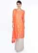 Peach zari embroidered suit paired with off white weaved palazzo and matching chiffon dupatta 