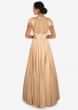 Peach gown in shimmer lycra carved in tassels and resham patchwork only on Kalki