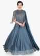 Pigeon blue silk gown with matching lycra cape with embellished neckline