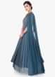 Pigeon blue silk gown with matching lycra cape with embellished neckline