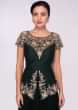Pine green lycra net gown with embroidered peplum style bodice 