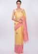 Pink and yellow shaded embroidered linen saree only on Kalki
