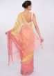 Pink and yellow shaded embroidered linen saree only on Kalki