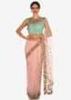 Pink and mint blue saree in net featuring the zardosi and 3D flower embroidery work only on Kalki
