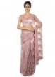 Pink embroidered net saree with scalloped border only on Kalki