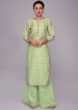 Pista green cotton silk palazzo suit set with coral pink weaved dupatta 