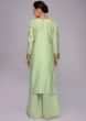 Pista green cotton silk palazzo suit set with coral pink weaved dupatta 