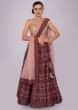 Plum and maroon shade cotton lehenga with self print and embroidery