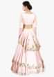 Powder pink multi layered crepe skirt paired with floral embroidered crop top