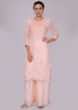 Powder pink palazzo suit set in self thread embroidery and butti