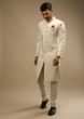 Pristine White Sherwani Set In Silk With Self Thread Embroidered Moroccan Jaal And Contrasting Pink Pocket Square  