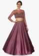 Purple crop top paired with  valintino satin skirt along with net freels dupatta