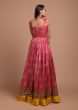 Rani Pink Anarkali Suit In Silk With Patola Print All Over And Mustard Frill On The Hem  