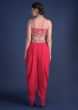 Fuschia Rose Crop Top And Dhoti Pants With Embossed Embroidery And Organza Cape  