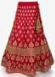 Rani pink lehenga in raw silk showcasing the heavy resham and sequin butti work only on Kalki