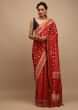Red Saree In Satin Silk With Woven Geometric Jaal And Butti Design