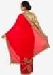 Red saree with beige blouse embellished in zardosi and frenchknot butti work only on Kalki