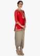 Red suit in embroidered placket matched with dhoti pants only on Kalki