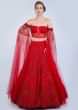 Ruby Red Lehenga In Heavily Embroidered Net With Fancy Off Shoulder Blouse With Long Fared Sleeves 