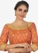 Rust brocade blouse in sequins and zari jewel neckonly