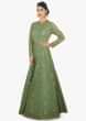 Sage green anarkali gown in thread work along with cut dana and sequins butt