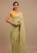 Sap Green Saree In Dola Silk With Woven Buttis And Floral Weave On The Pallu