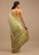 Sap Green Saree In Dola Silk With Woven Buttis And Floral Weave On The Pallu