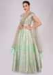 Sea green net anarkali in sequins embroidery and patch work 